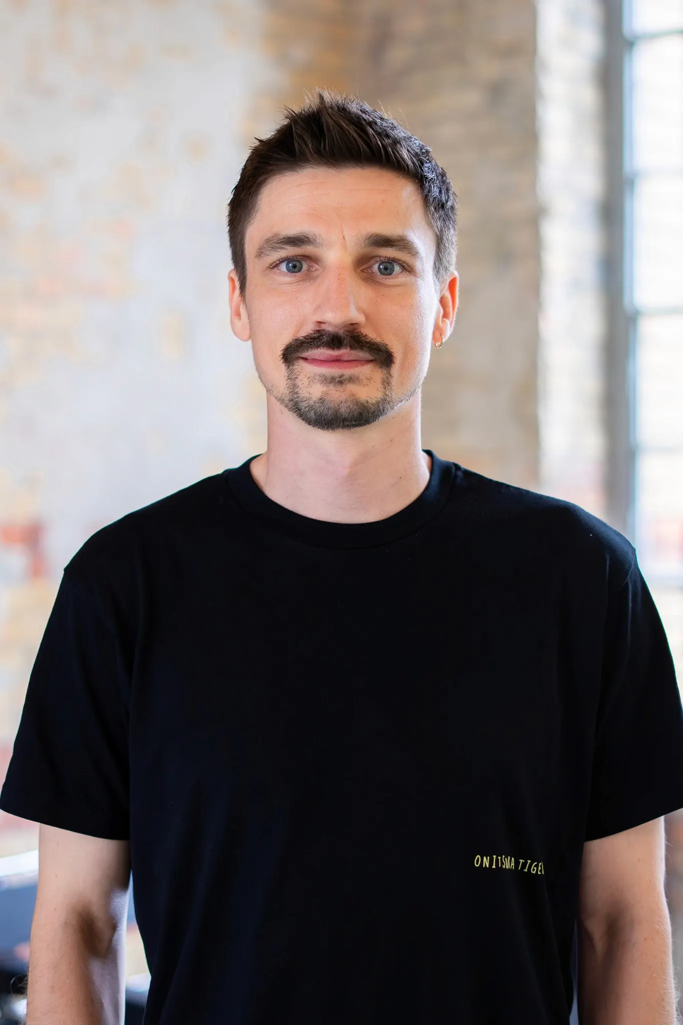 Portrait von Christopher Müller, Geschäftsführer von DAYONE