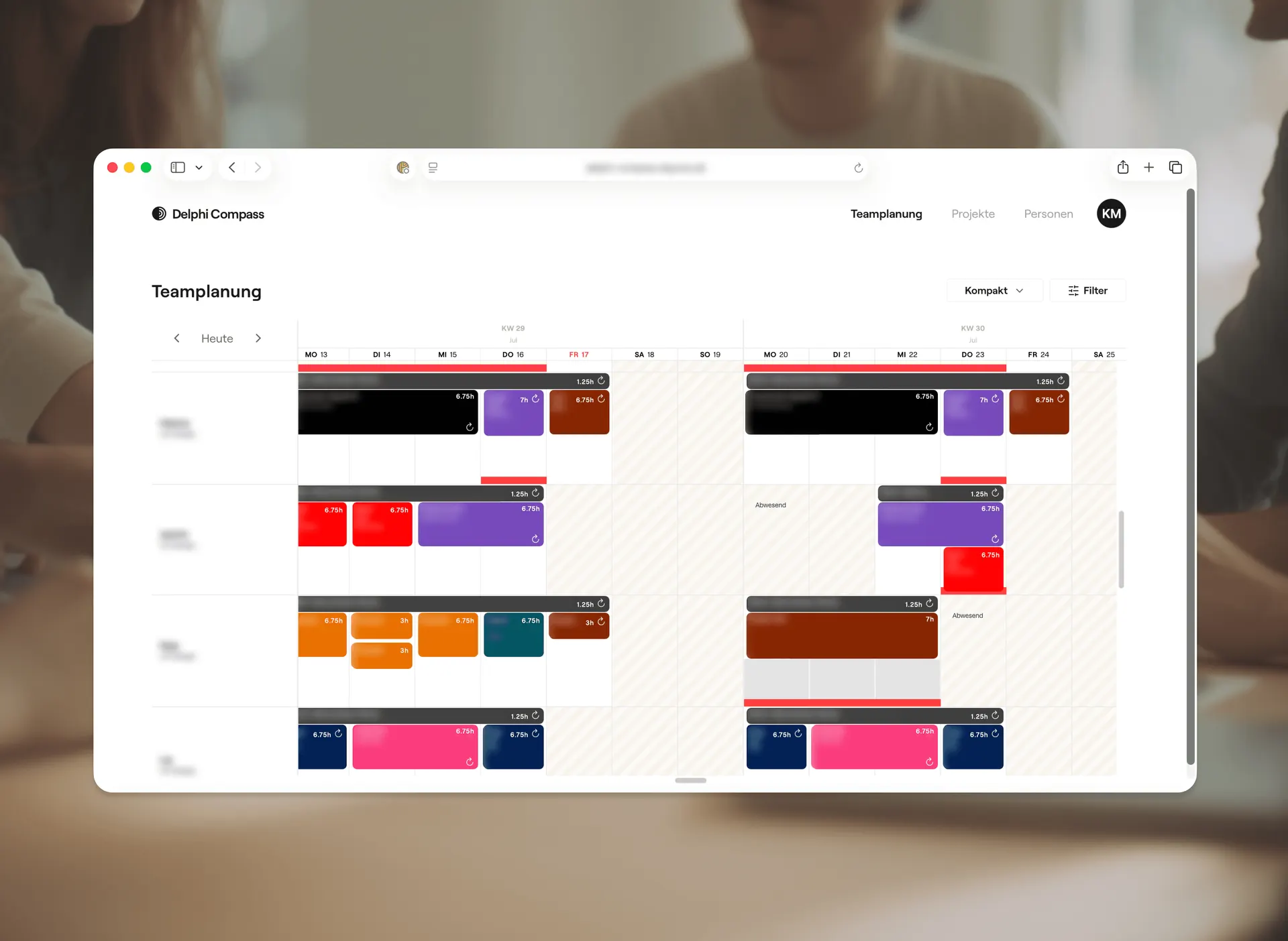 Browser window of the Delphi Compass app showing team planning with colour-coded project bookings across two calendar weeks